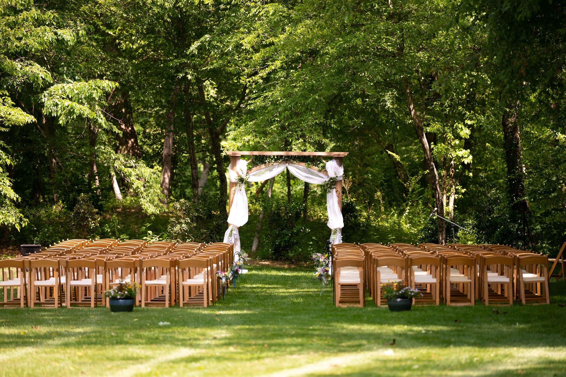 Rows of ceremony chairs on the lawn