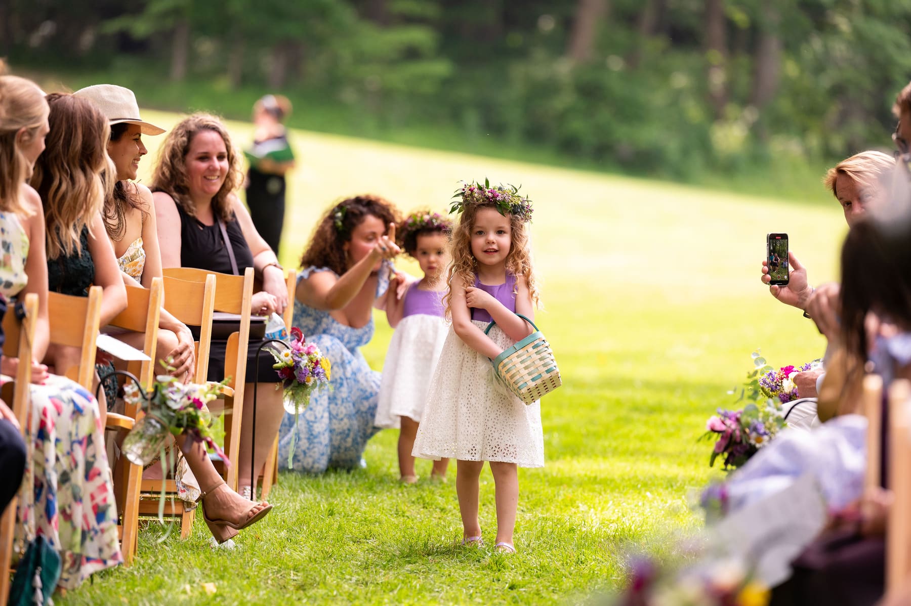 Flower girl walking the aisle