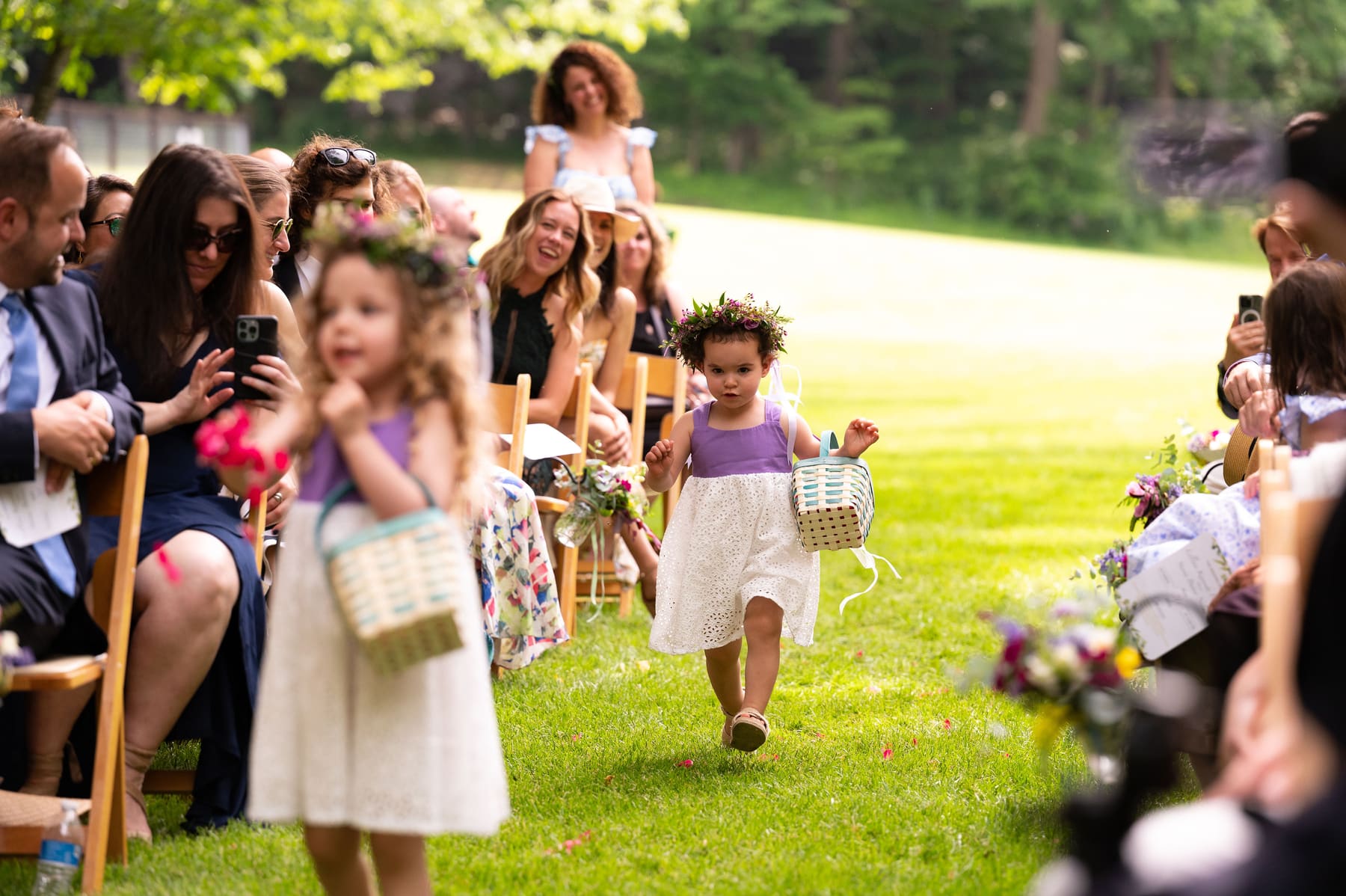 Flower girl scattering petals