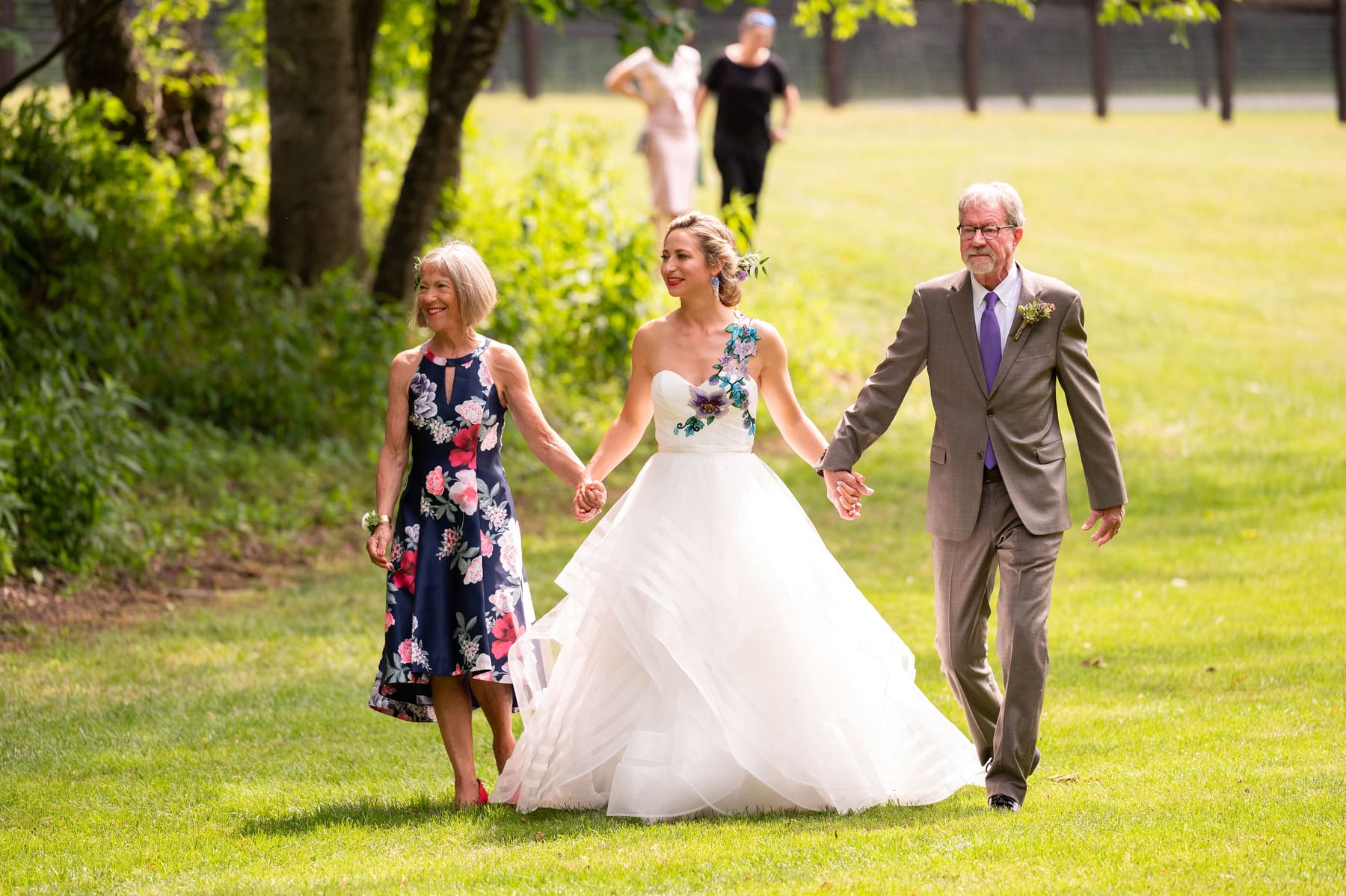 Lillian walking toward the ceremony
