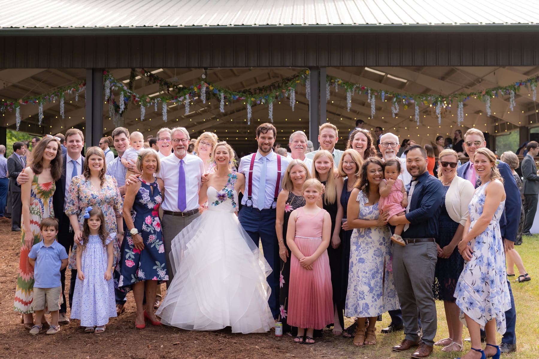 Full guest group outside the reception
