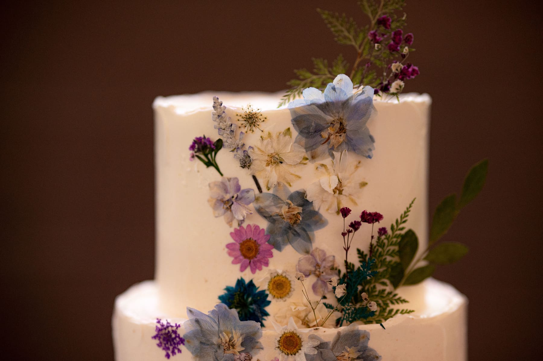 Pressed flower wedding cake