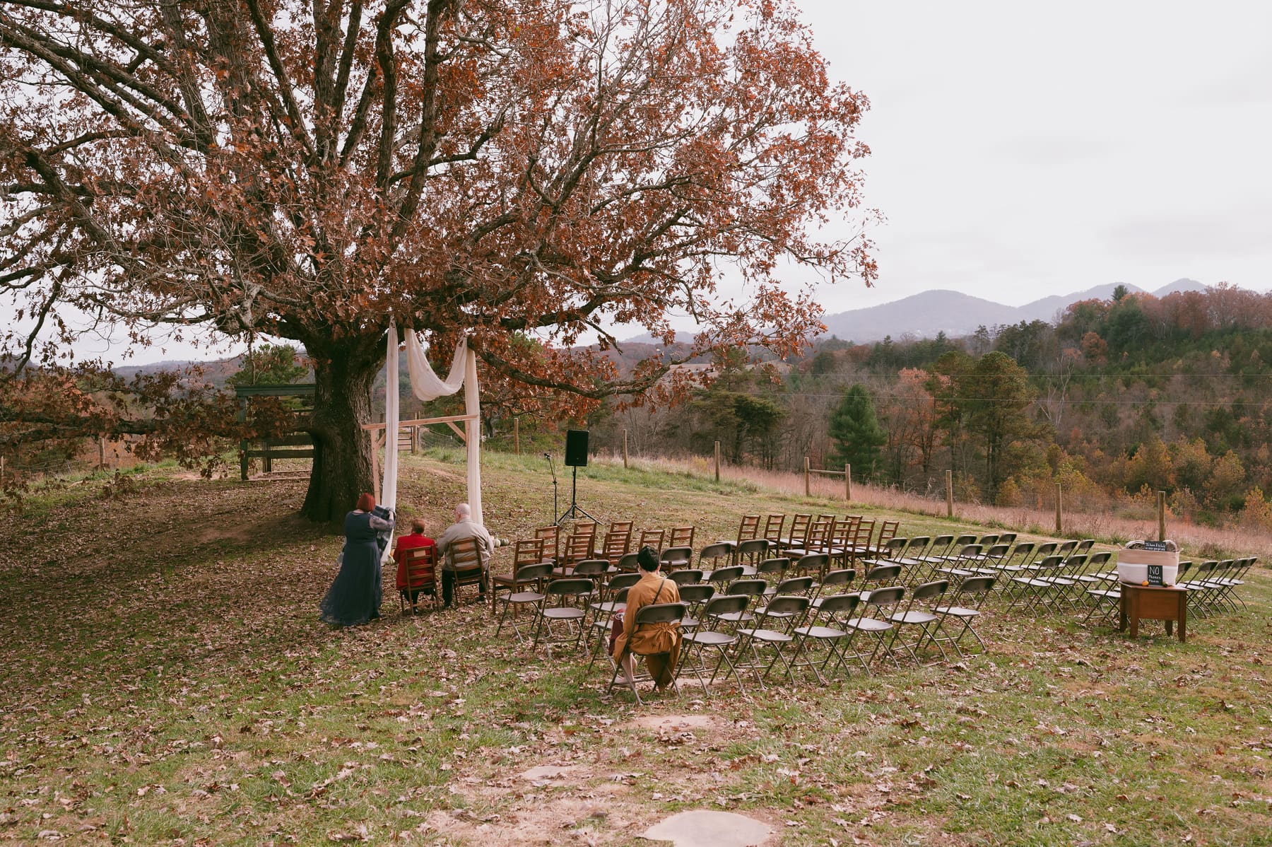 The wedding venue framed by fall color