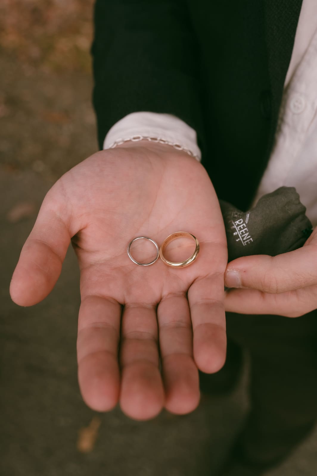 Wedding rings held in open palms