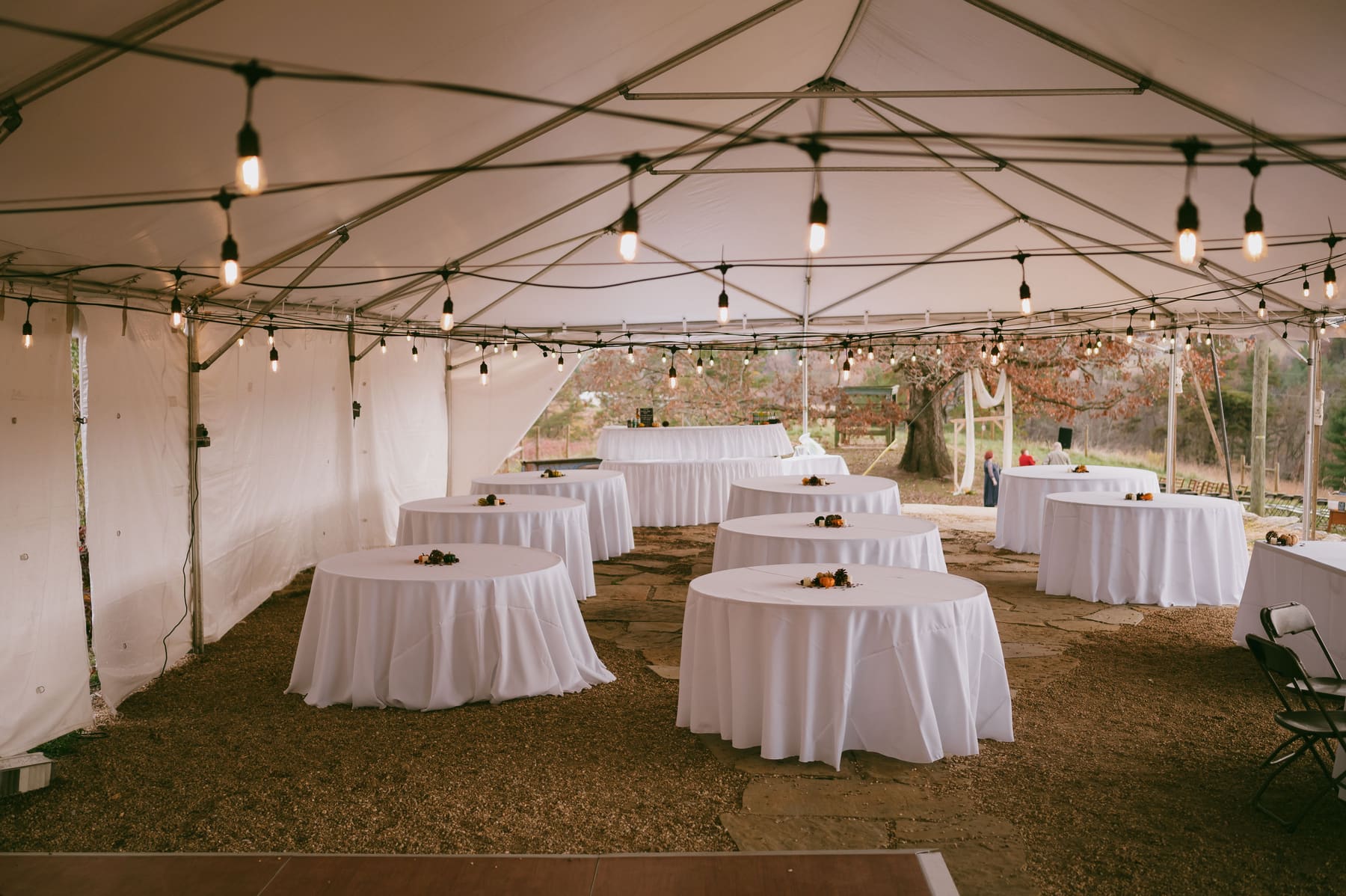Reception tent prepared for dinner