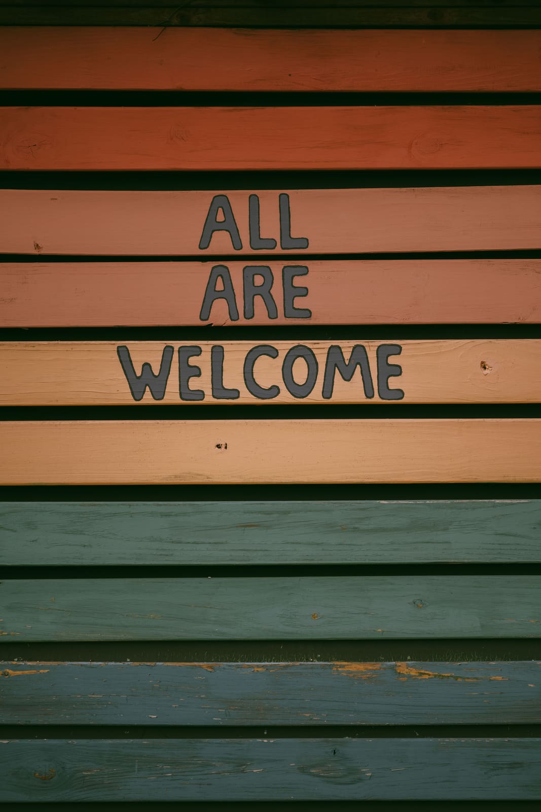 Wooden welcome sign on the property