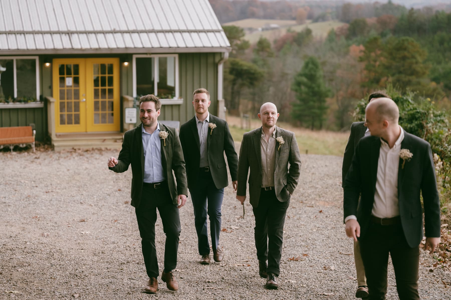 Groomsmen walking outside before the ceremony