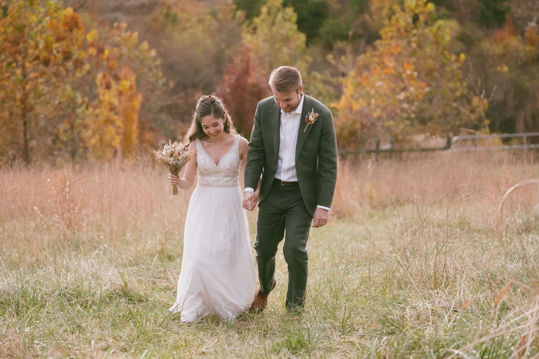Robin and Jacob walking through the field