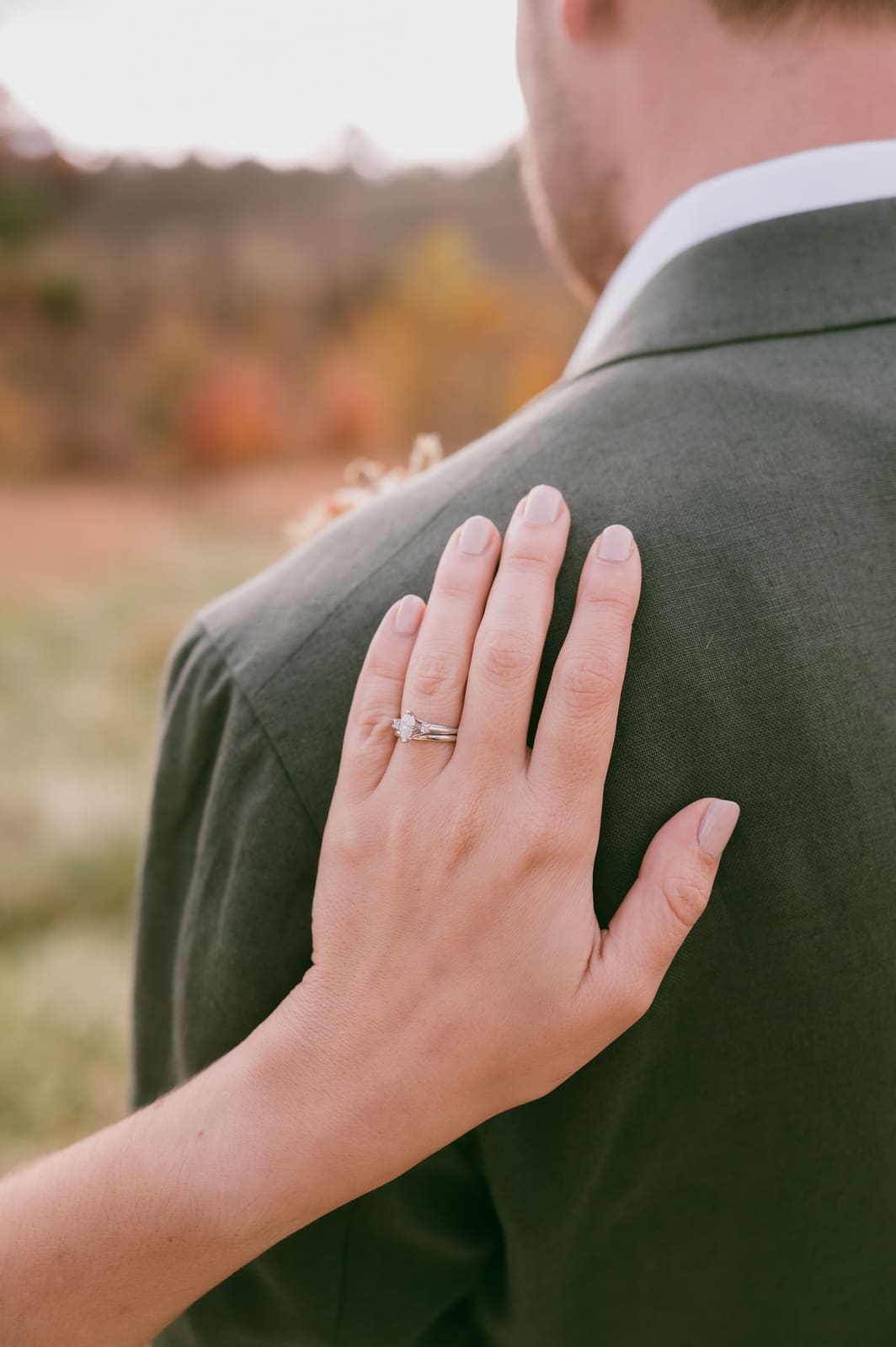 Wedding band detail on hand