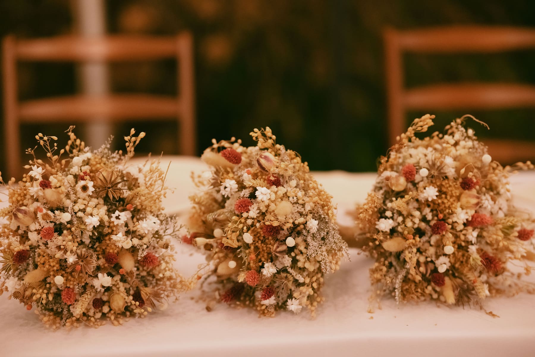 Bouquets lined up on a table